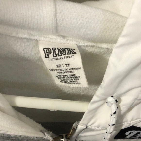 Grey zip up sweater with a hood that is waterproof - Picture 2 of 4